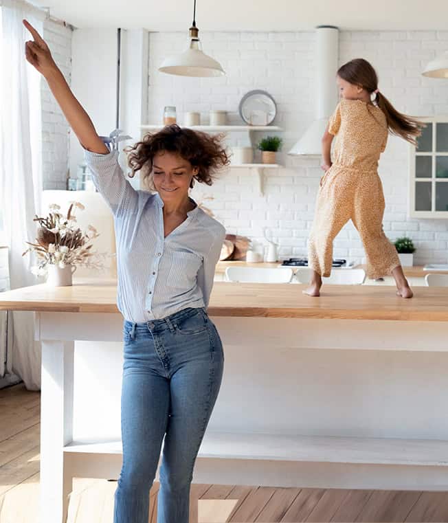 Child and adult dancing