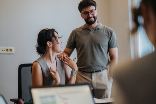 Homebuyers meeting with a mortgage loan officer