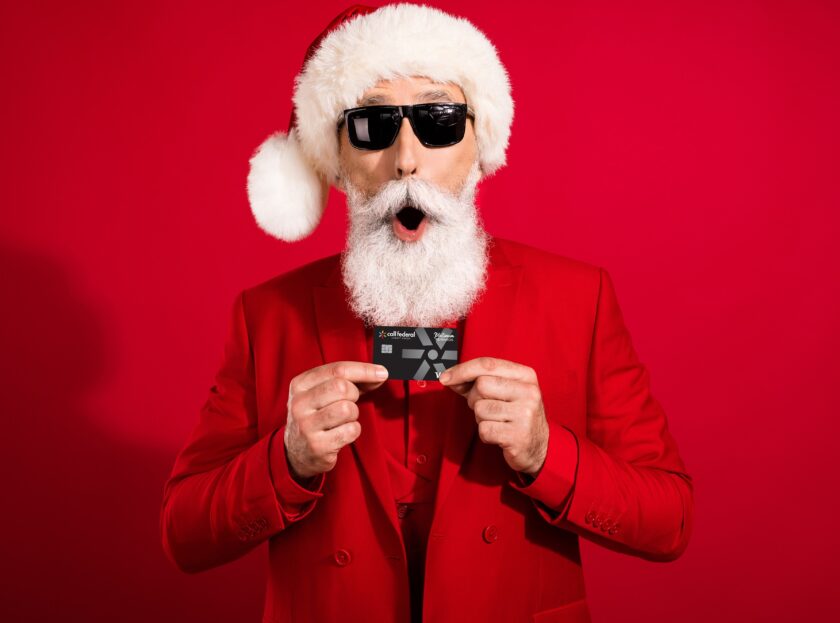 Santa holding a Credit Card